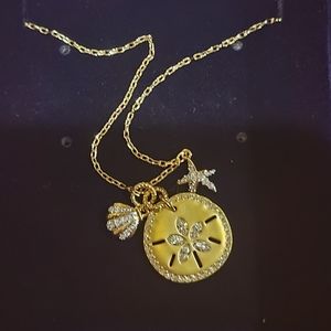 Swarovski sand dollar necklace